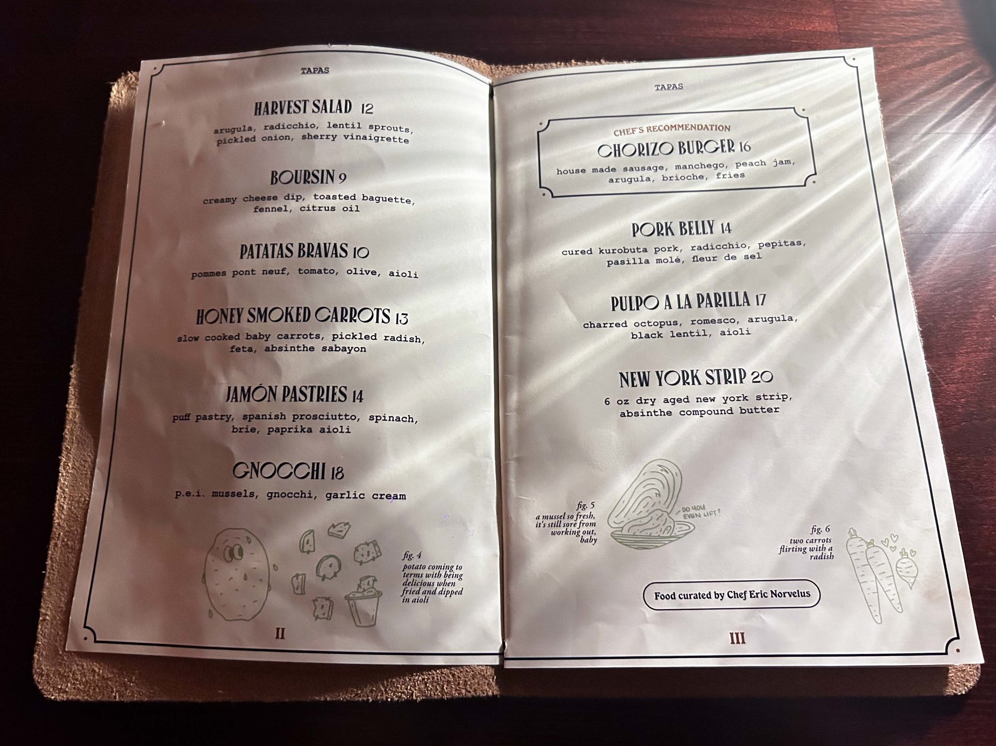 white food menu in a brown book